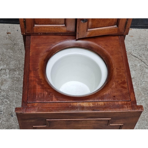 1012 - A 19th century mahogany and inlaid commode, 45cm wide.