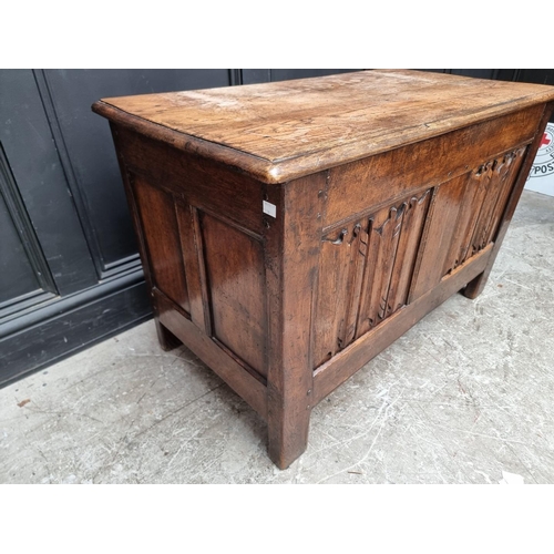 1015 - A good reproduction oak linenfold coffer, 96.5cm wide.