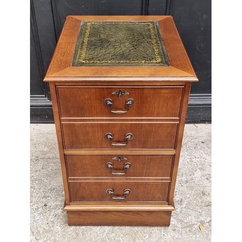 1018 - A modern oak filing cabinet, with two drawers simulating four drawers, 49.5cm wide.... 