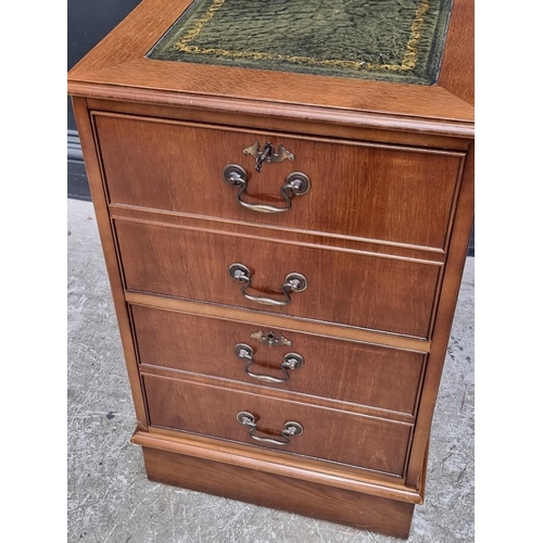 1018 - A modern oak filing cabinet, with two drawers simulating four drawers, 49.5cm wide.... 