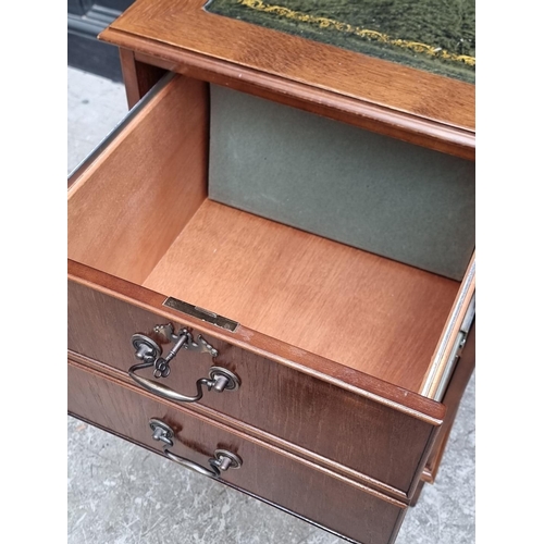 1018 - A modern oak filing cabinet, with two drawers simulating four drawers, 49.5cm wide.... 