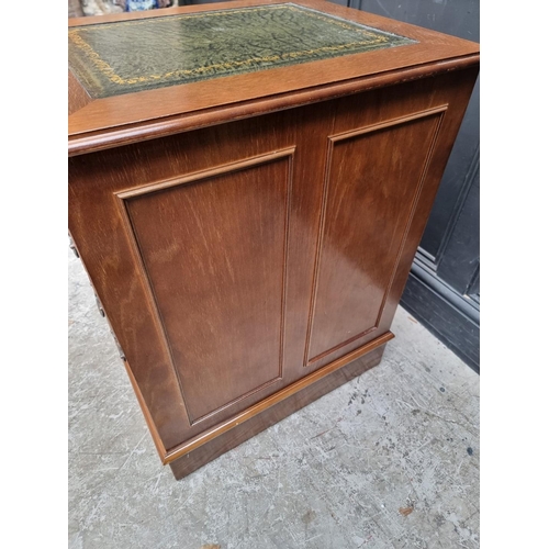 1018 - A modern oak filing cabinet, with two drawers simulating four drawers, 49.5cm wide.... 