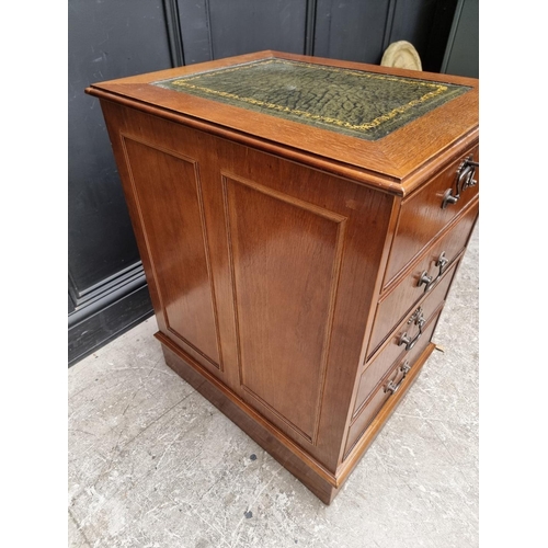 1018 - A modern oak filing cabinet, with two drawers simulating four drawers, 49.5cm wide.... 