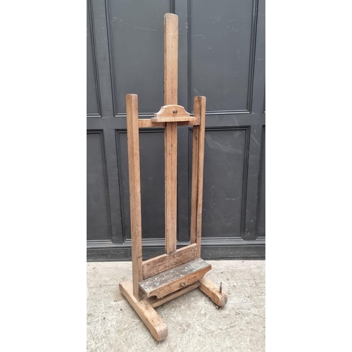 1025 - An old oak artist's easel, bearing brass plaque inscribed 'Lechertier Barbe & Co, 60 Regent St, ... 