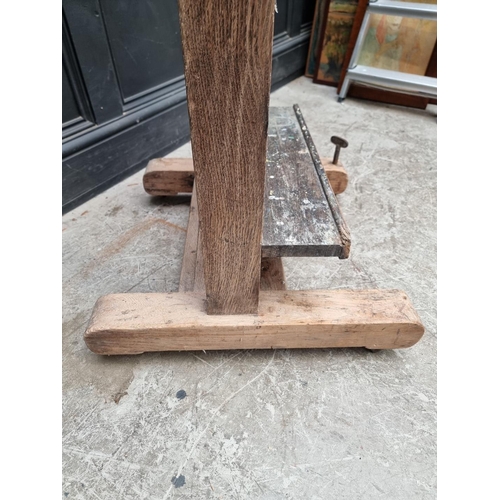 1025 - An old oak artist's easel, bearing brass plaque inscribed 'Lechertier Barbe & Co, 60 Regent St, ... 