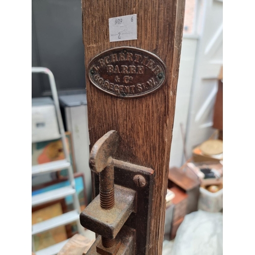 1025 - An old oak artist's easel, bearing brass plaque inscribed 'Lechertier Barbe & Co, 60 Regent St, ... 