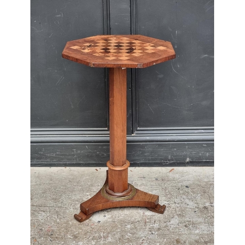 1031 - A mahogany and chequerboard inlaid octagonal pedestal table, 43.5cm wide.