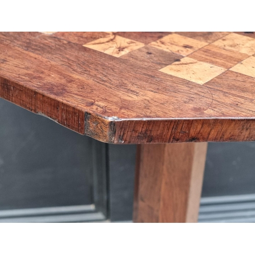 1031 - A mahogany and chequerboard inlaid octagonal pedestal table, 43.5cm wide.