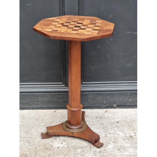 1031 - A mahogany and chequerboard inlaid octagonal pedestal table, 43.5cm wide.