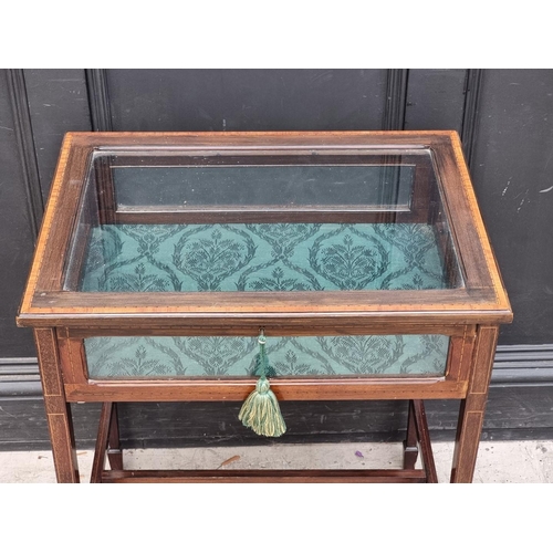 1035 - A late Victorian mahogany, line inlaid and crossbanded bijouterie table, 60.5cm wide.... 