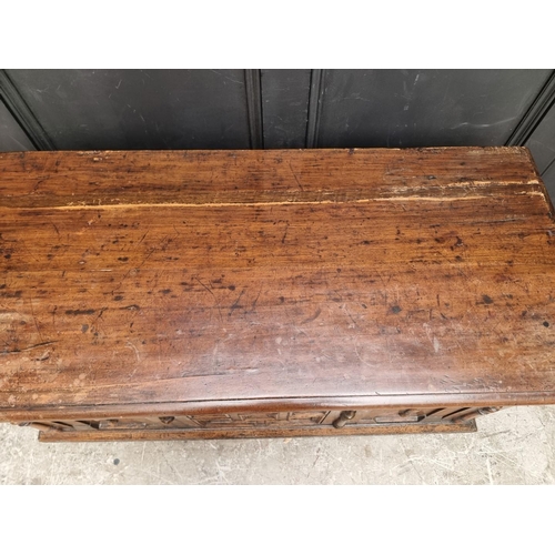 1036 - An old oak coffer, 114.5cm wide.