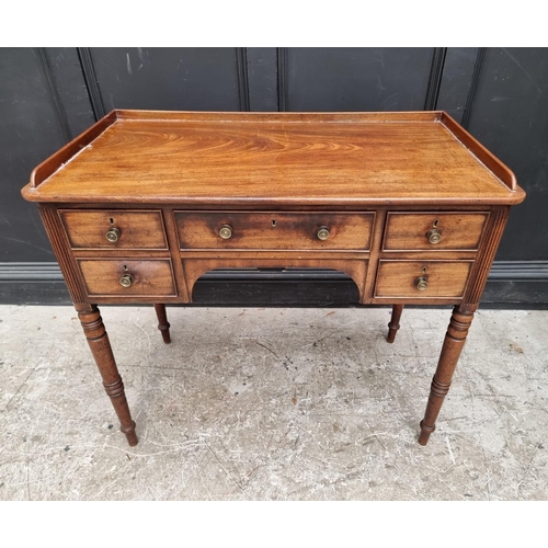 1038 - A Regency mahogany washstand, in the manner of Gillows, 94cm wide.