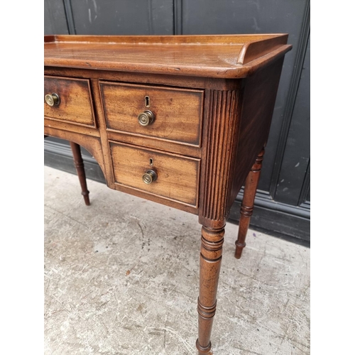 1038 - A Regency mahogany washstand, in the manner of Gillows, 94cm wide.