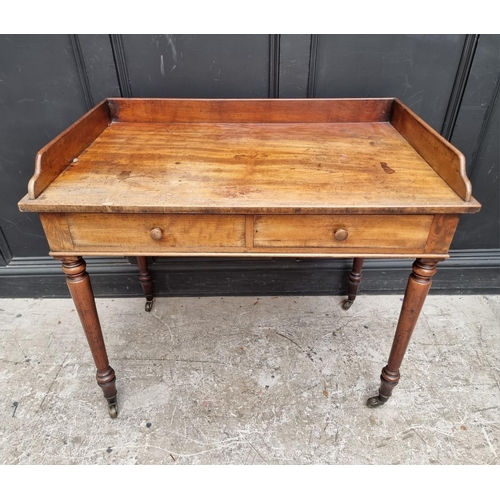 1039 - A 19th century mahogany washstand, 96cm wide.