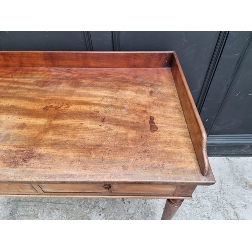 1039 - A 19th century mahogany washstand, 96cm wide.