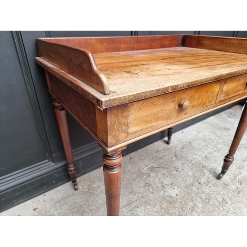 1039 - A 19th century mahogany washstand, 96cm wide.