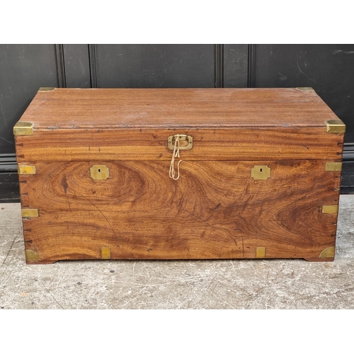 1044 - An antique camphor wood and brass bound chest, 101.5cm wide.