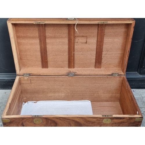 1044 - An antique camphor wood and brass bound chest, 101.5cm wide.