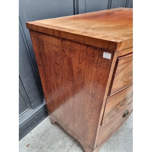 1045 - A Regency figured mahogany and crossbanded  bowfront chest of drawers, 104.5cm wide.... 