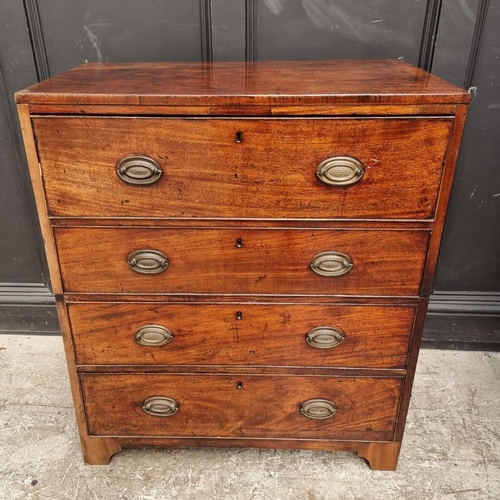 1046 - An unusual Regency mahogany secretaire chest, with side carrying handles, in two parts, 82cm wide.... 