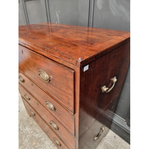 1046 - An unusual Regency mahogany secretaire chest, with side carrying handles, in two parts, 82cm wide.... 