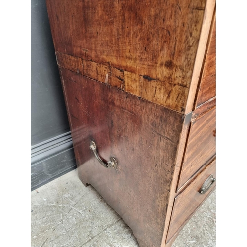 1046 - An unusual Regency mahogany secretaire chest, with side carrying handles, in two parts, 82cm wide.... 