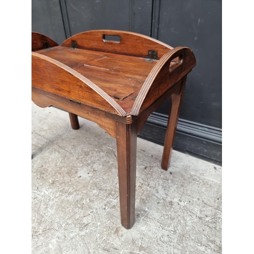 1047 - An old mahogany folding butler's tray, 80cm wide, on stand.