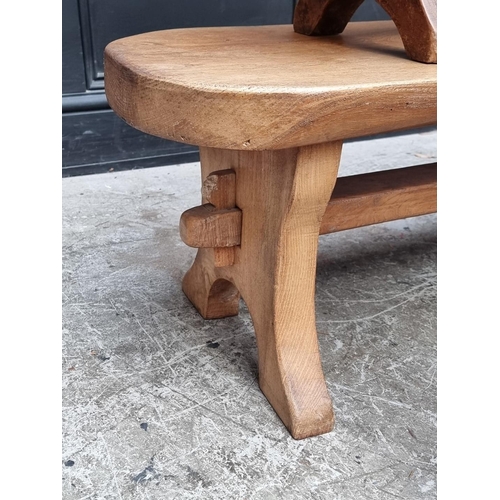 1048 - Three similar elm rustic stools, largest 99cm wide.