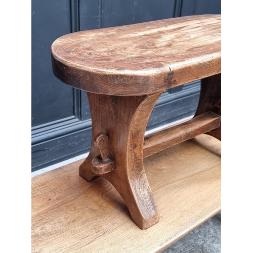 1048 - Three similar elm rustic stools, largest 99cm wide.