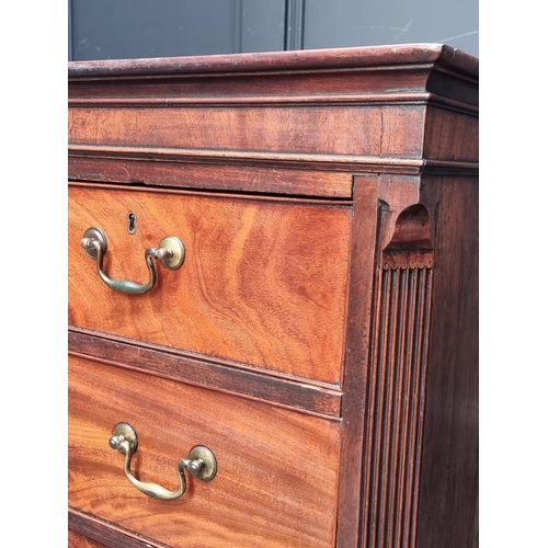 1052 - A George III mahogany chest on chest, 111cm wide, (feet replaced).