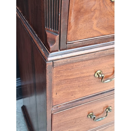 1052 - A George III mahogany chest on chest, 111cm wide, (feet replaced).