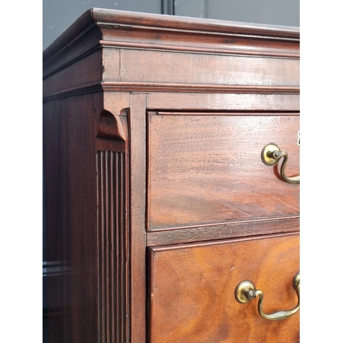 1052 - A George III mahogany chest on chest, 111cm wide, (feet replaced).