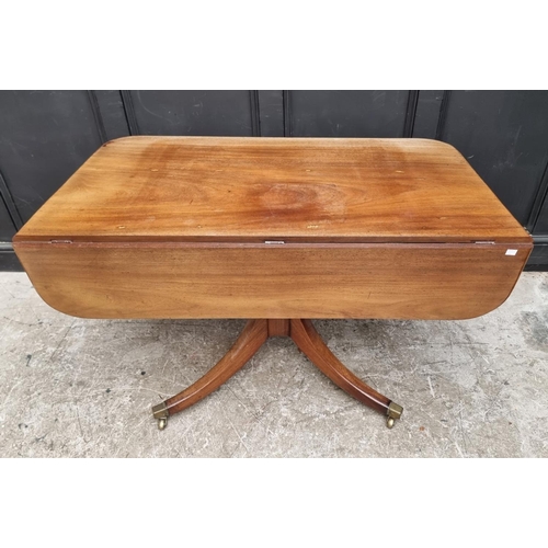 1057 - A 19th century mahogany tilt-top breakfast table, with drop leaf to one side, 122.5cm wide.... 