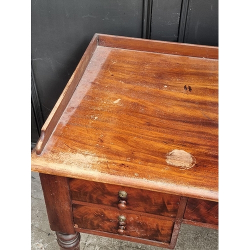 1059 - A Victorian mahogany washstand, 122cm wide.