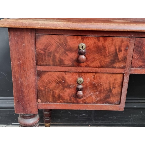 1059 - A Victorian mahogany washstand, 122cm wide.