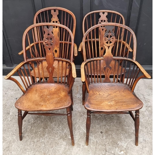 1062 - Four similar 19th century ash, elm and beech wheelback Windsor armchairs.