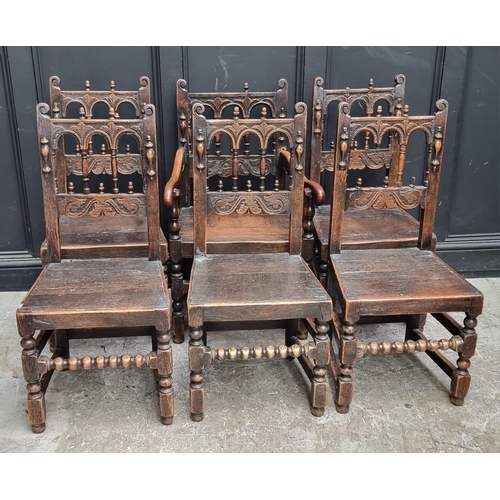 1063 - A set of six antique carved oak dining chairs, to include an elbow chair.