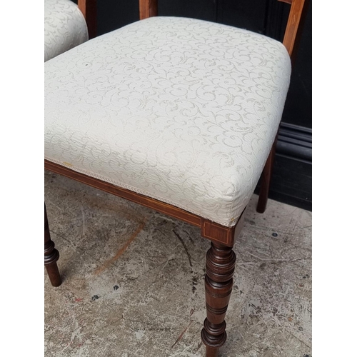 1068 - A pair of late 19th century rosewood and inlaid lyre back salon chairs.