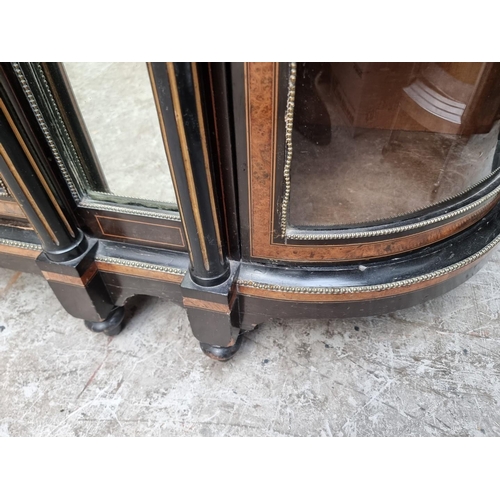 1076 - A Victorian ebonized, thuya and brass mounted credenza, with porcelain and mirrored panels, 182cm wi... 