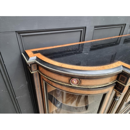 1076 - A Victorian ebonized, thuya and brass mounted credenza, with porcelain and mirrored panels, 182cm wi... 