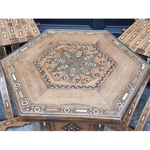 1078 - A Moorish parquetry and bone hexagonal occasional table, 47.5cm wide; together with a similar pair o... 