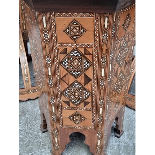 1078 - A Moorish parquetry and bone hexagonal occasional table, 47.5cm wide; together with a similar pair o... 