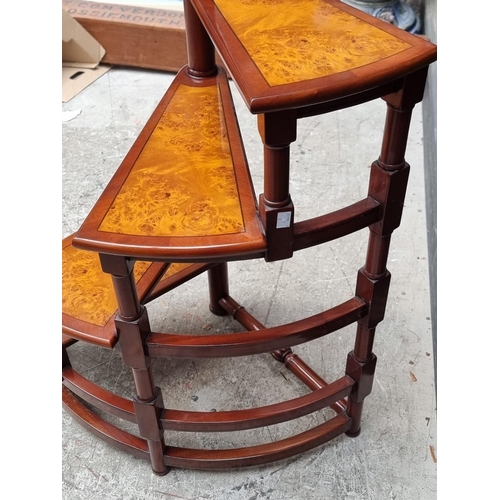 1084 - A set of mahogany and burr walnut spiral four tread library steps, 159cm high.