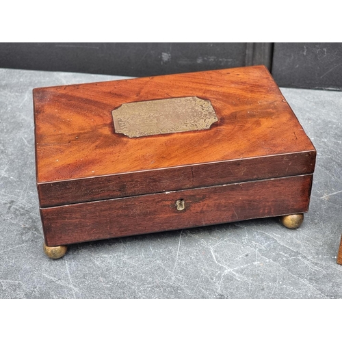 1087 - A 19th century solid mahogany box, the sliding top applied with a cross, 19.5cm wide; together ... 