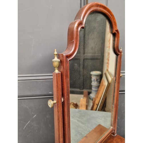 1093 - A Queen Anne style mahogany toilet mirror, with bone knobs, 80.5cm high.