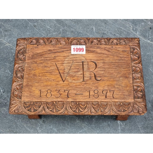 1099 - A Victorian carved oak 1897 Jubilee commemorative footstool, 28cm wide.