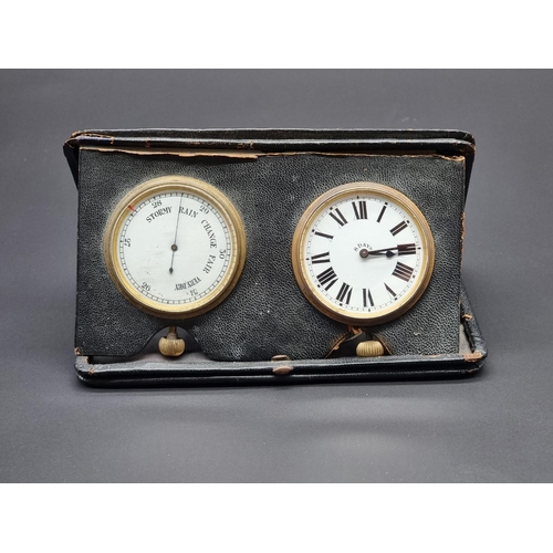 1112 - An early 20th century travelling clock and barometer set, each with 5.5cm enamel dial, in leather fo... 