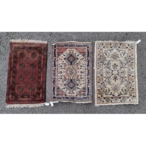 1128 - Three Persian prayer rugs, largest 92 x 61cm.