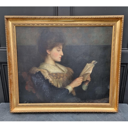 1175 - English School, early 20th century, bust length portrait of a lady reading, oil on canvas, 62.5 x 74... 