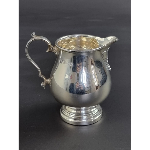 11 - A silver milk jug, by Elkington & Co, Birmingham 1968, 10.5cm high, 169g.